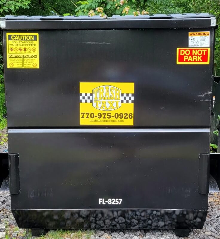 A front-load dumpster for a business in the Atlanta, GA Area